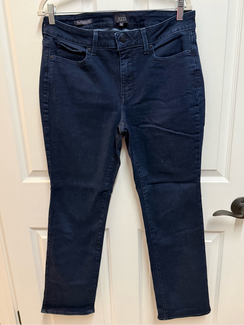 NYDJ (Not Your Daughter's Jeans) dark-wash blue denim skinny ankle jeans.